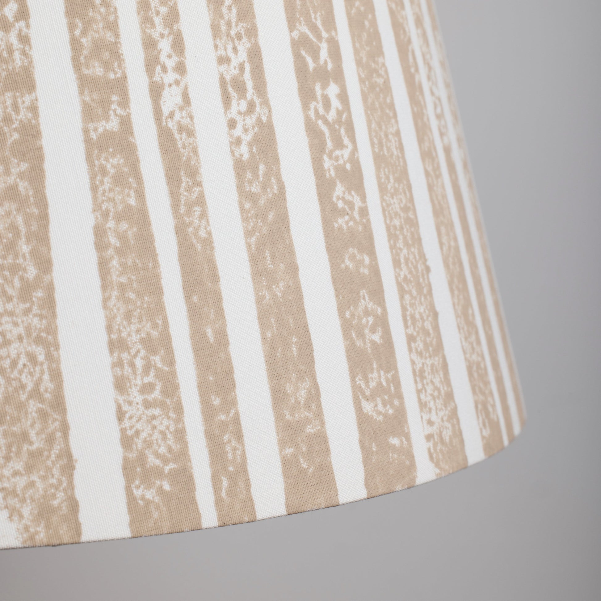 Close up of brown striped lampshade