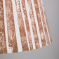 Close-up of the Devon Rock handmade lampshade showing its textured orange stripe pattern. A bold stripe lampshade with geometric detail, perfect as empire shades for table lamps, floor lamps and wall lights.