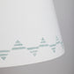 Close up of a cream lampshade with a blue triangle pattern – bold geometric empire lampshade in cream cotton, perfect for modern interiors.