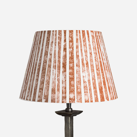 Empire lampshade with bold vertical stripes in orange and cream. A stylish striped lampshade handmade in the UK, ideal for colourful lampshade collections and modern striped lighting.