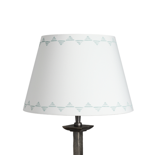 Flipped Trigon handmade lampshade in white with soft blue inverted triangle border pattern, artisan-crafted for table or wall lamps, ideal for modern, colourful, and Scandinavian-inspired home décor.