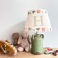 Personalised kids lampshade with safari animals printed on it